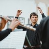 Иван Колованов дирижирует квартетом флейт (солисты Театра оперы и балета).